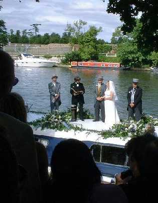 picture of wedding on roof of boat